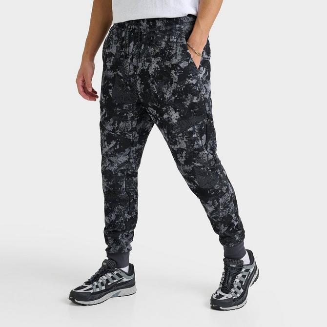 nike tech fleece camo joggers in white