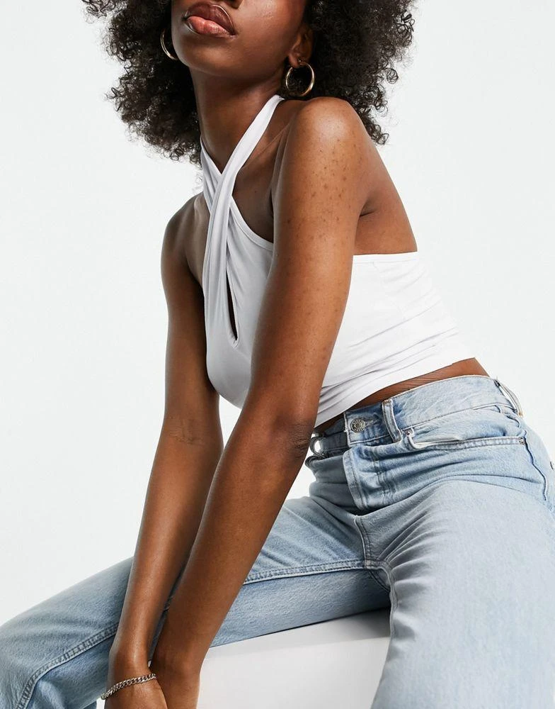 商品ASOS|ASOS DESIGN Hourglass crop top with wrap halter neck in white,价格¥45,第2张图片详细描述