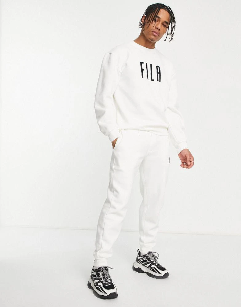 商品Fila|Fila heritage sweatshirt in off white,价格¥453,第2张图片详细描述