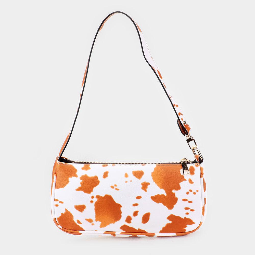 Bolsa a tiracolo em pele sintética com estampa de vaca image 2