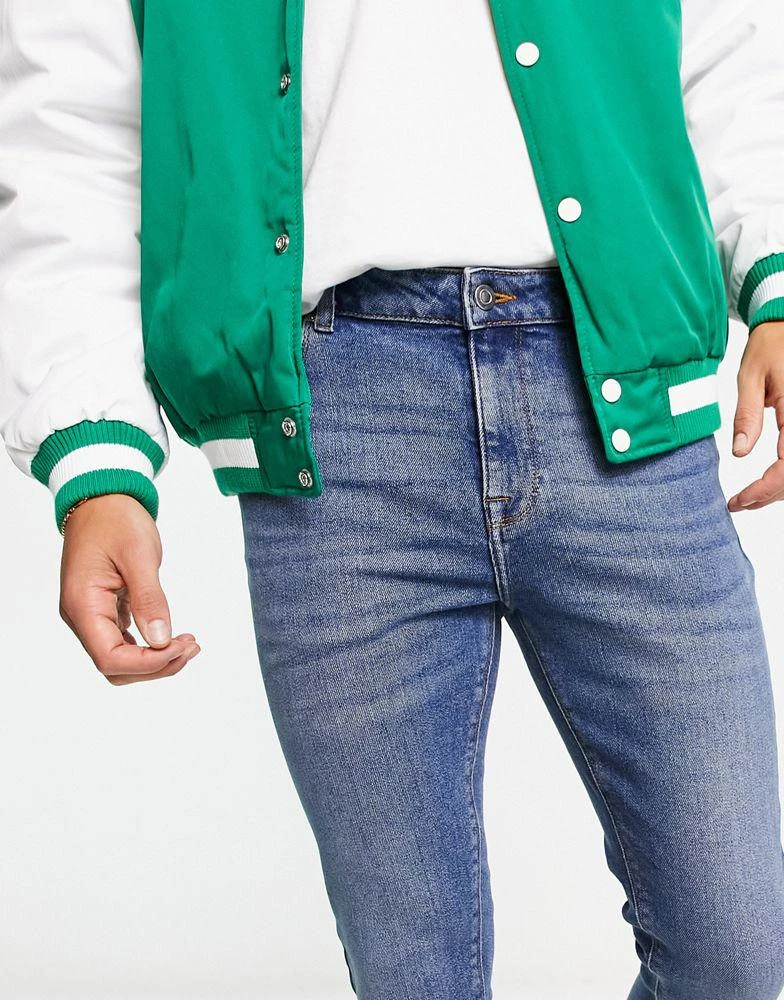 商品ASOS|ASOS DESIGN power stretch jeans in mid wash blue,价格¥174,第5张图片详细描述