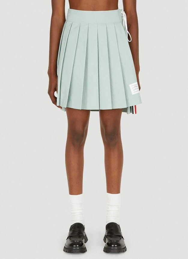 商品Thom Browne|Dropped Hem Pleated Mini Skirt in Green,价格¥4360,第1张图片