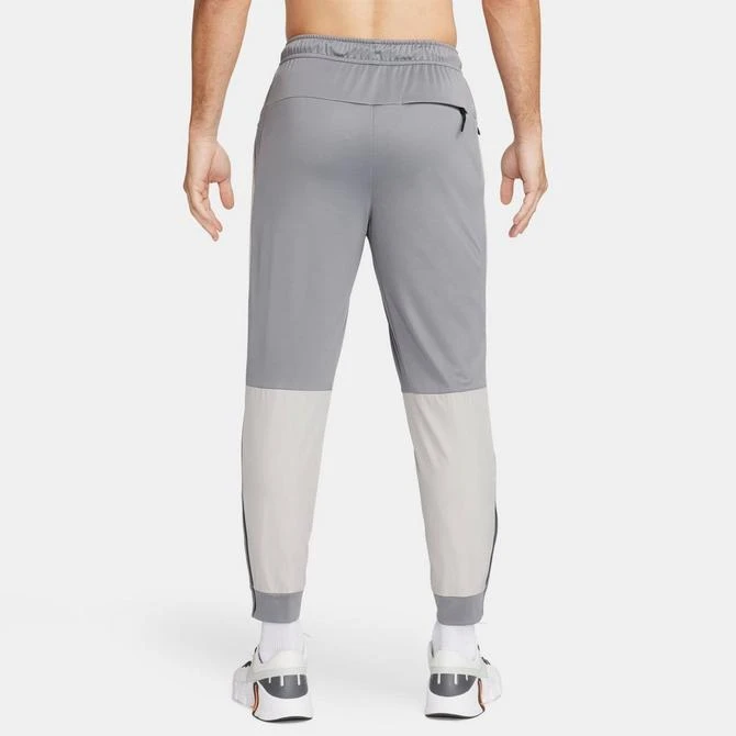 商品NIKE|Men's Nike Unlimited Water-Repellent Tapered Versatile Pants,价格¥695,第2张图片详细描述
