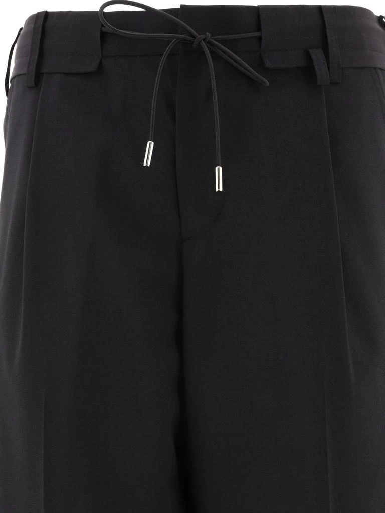 商品Sacai|Sacai Drawstring Mid-Rise Tapered Trousers,价格¥2587,第3张图片详细描述