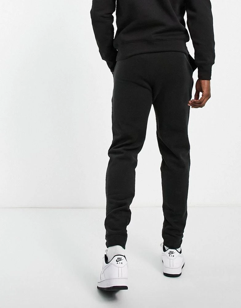 商品Tommy Hilfiger|Tommy Hilfiger lounge flag joggers in black,价格¥644,第2张图片详细描述