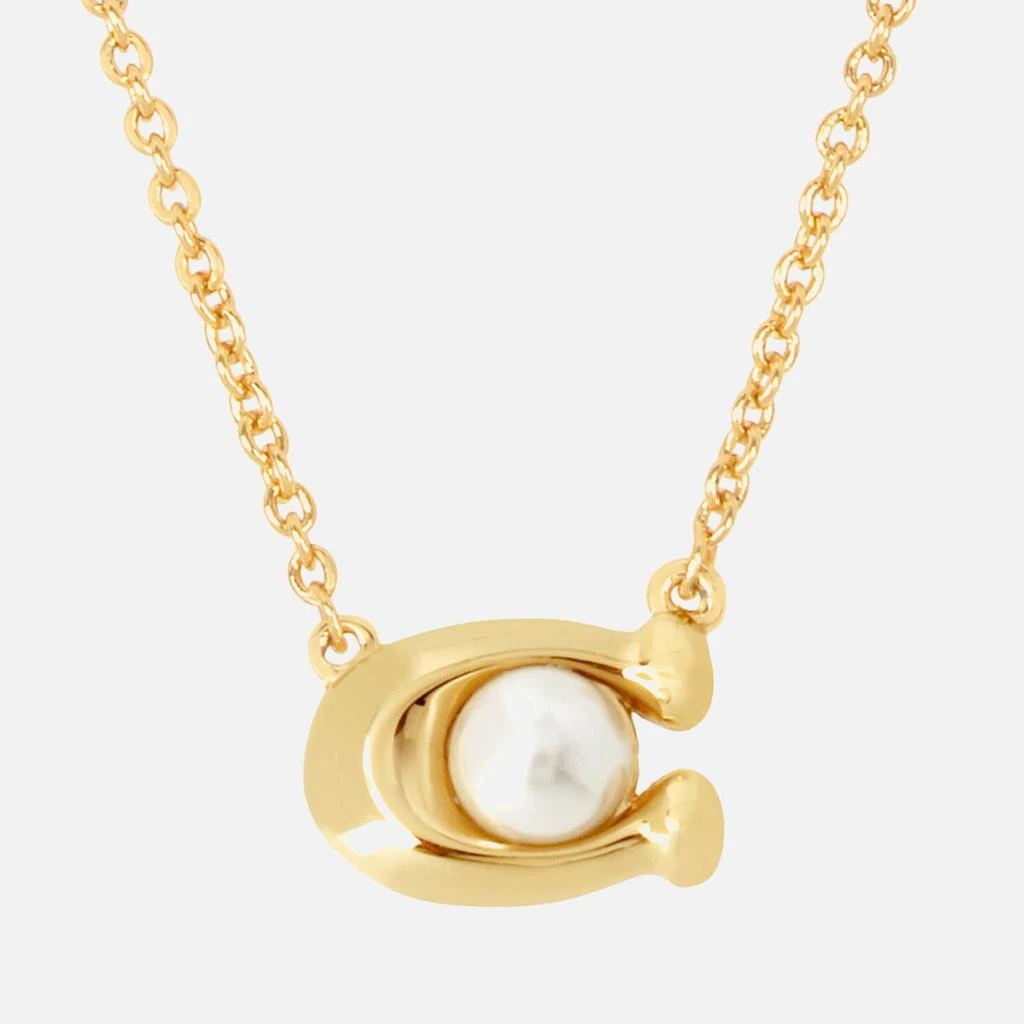 商品Coach|Coach Pearl Signature Gold-Tone Pendant Necklace,价格¥600,第2张图片详细描述