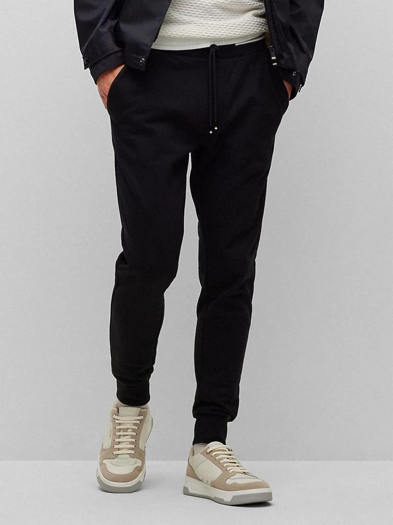 商品Hugo Boss|Organic-Cotton Tracksuit Bottoms With Signature-Stripe Waistband,价格¥661,第3张图片详细描述