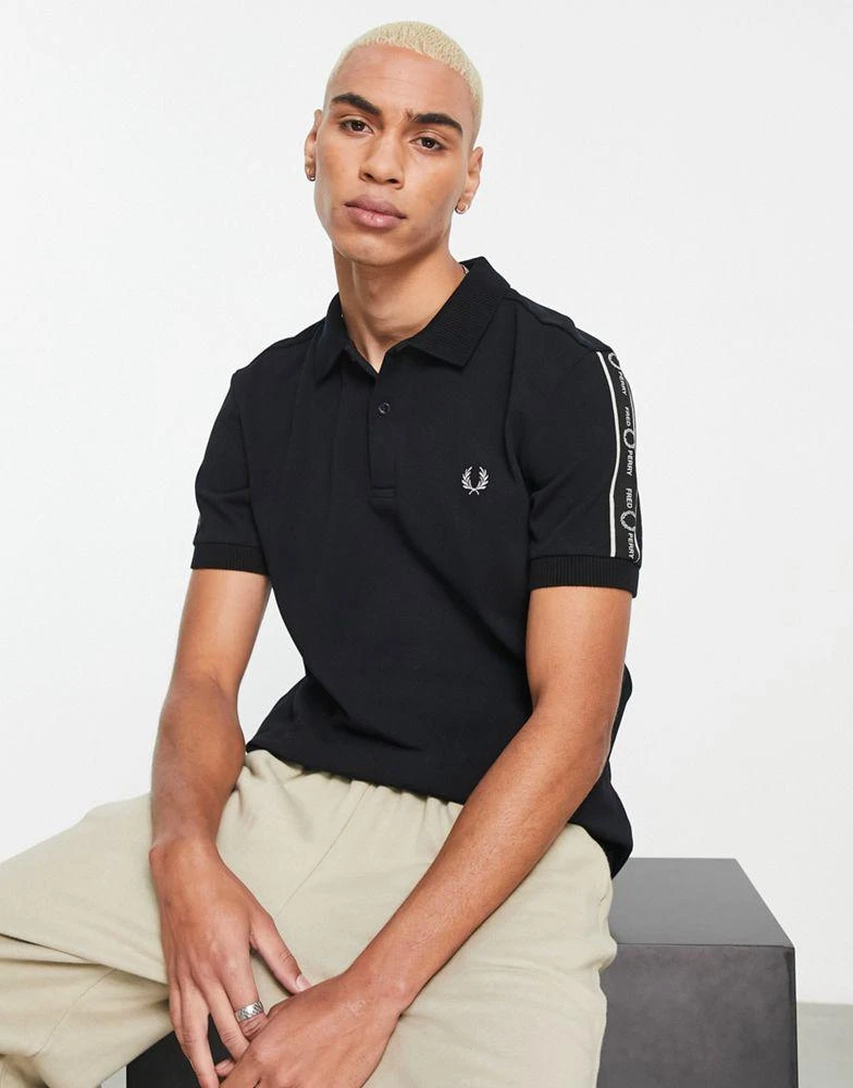 商品Fred Perry|Fred Perry taped sleeve polo shirt in black,价格¥721,第1张图片