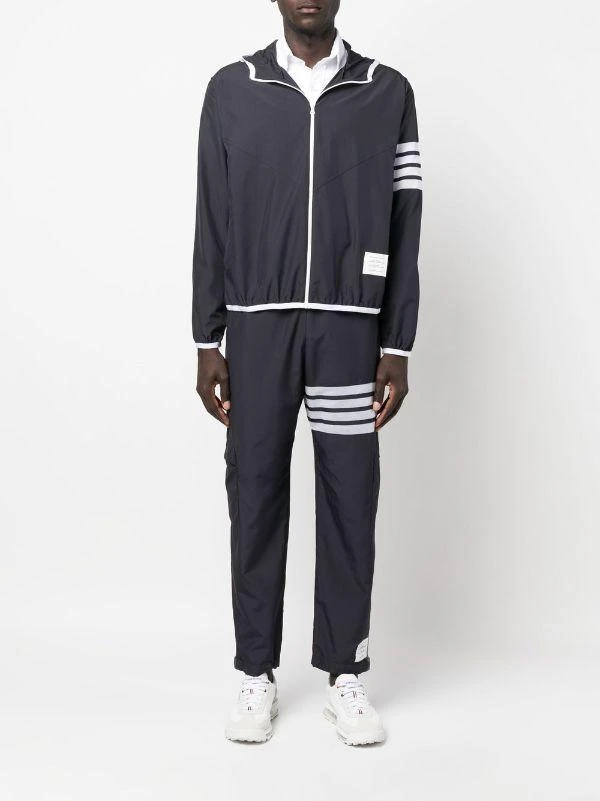 商品Thom Browne|THOM BROWNE MEN PACKABLE ZIP UP HOODIE W/ SEAMED IN MESH 4 BAR STRIPE IN MILITARY RIPSTOP,价格¥4755,第3张图片详细描述