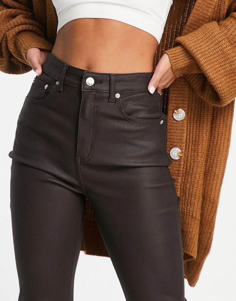 商品ASOS|ASOS DESIGN Petite power stretch flared jeans in coated chocolate brown,价格¥172,第3张图片详细描述