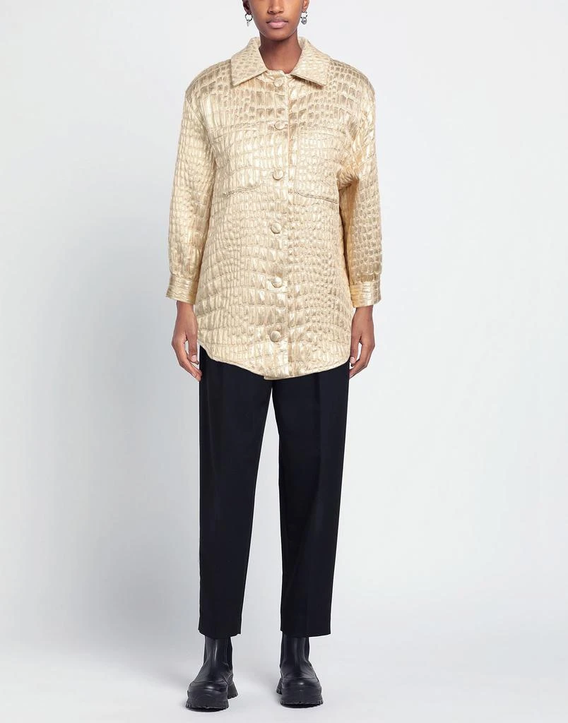 商品BLUMARINE|Solid color shirts & blouses,价格¥1661,第2张图片详细描述