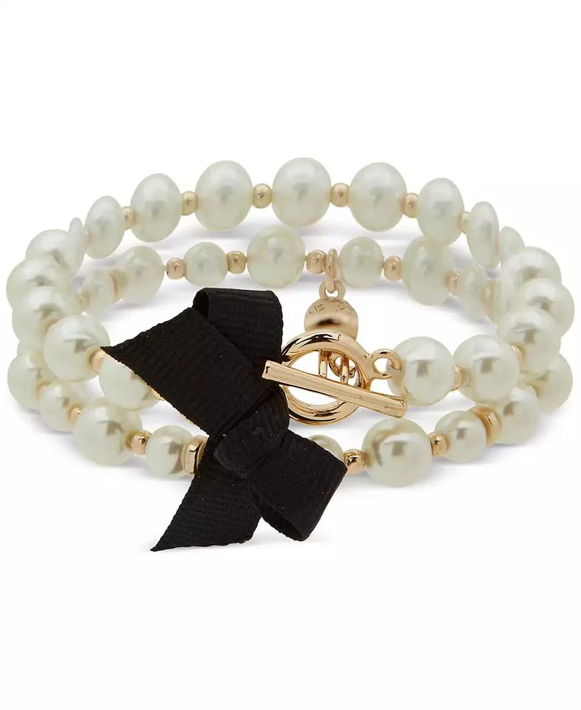 商品Anne Klein|Gold-Tone Imitation Pearl & Black Bow Double Row Toggle Stretch Bracelet,价格¥285,第1张图片