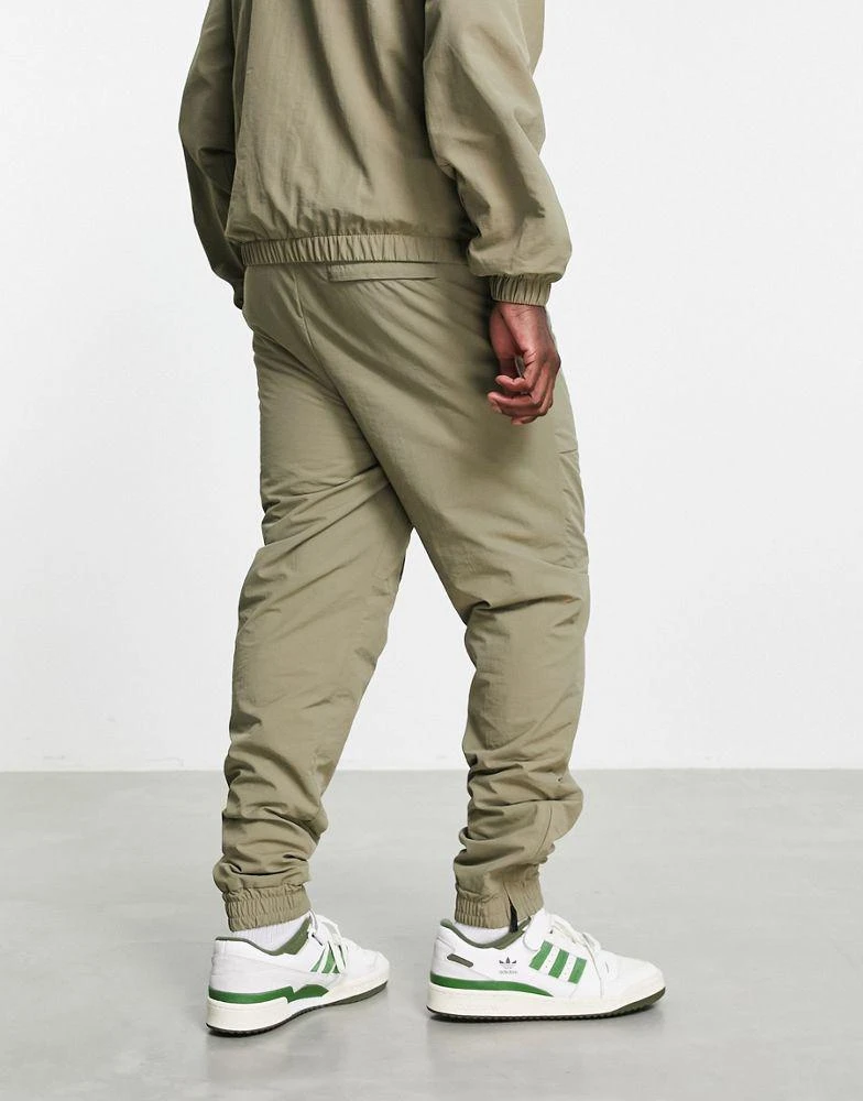 商品Fila|Fila Gold joggers in green,价格¥397,第2张图片详细描述