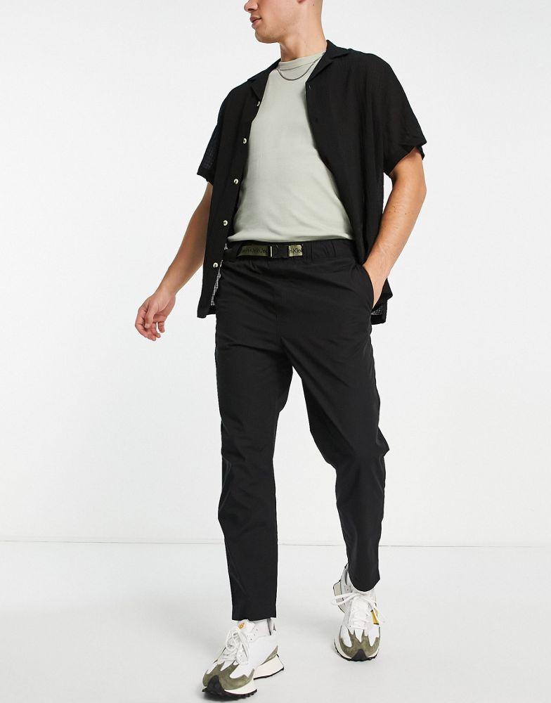 商品Calvin Klein|Calvin Klein Jeans utility tab belt loose woven trousers in black,价格¥565,第1张图片