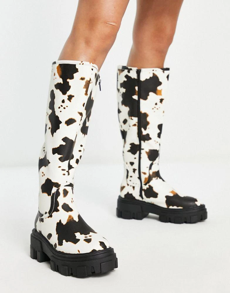 商品ASOS|ASOS DESIGN Carla chunky flat knee boots in cow print,价格¥164,第1张图片