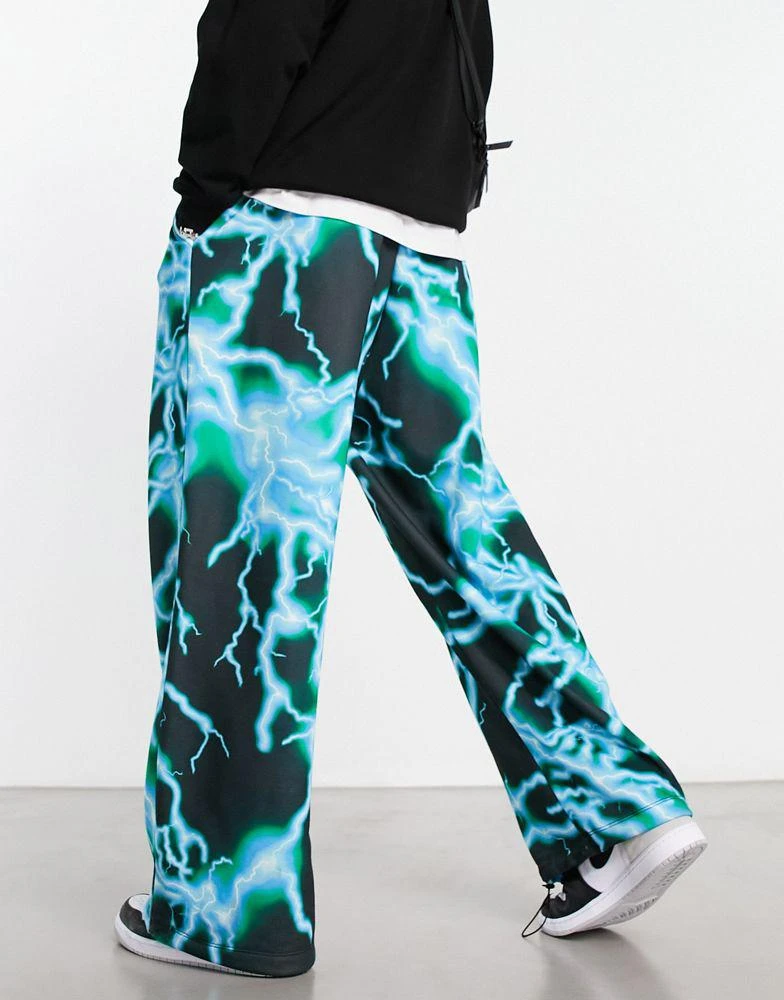 商品ASOS|ASOS DESIGN oversized parachute joggers in lightning all over print,价格¥199,第4张图片详细描述