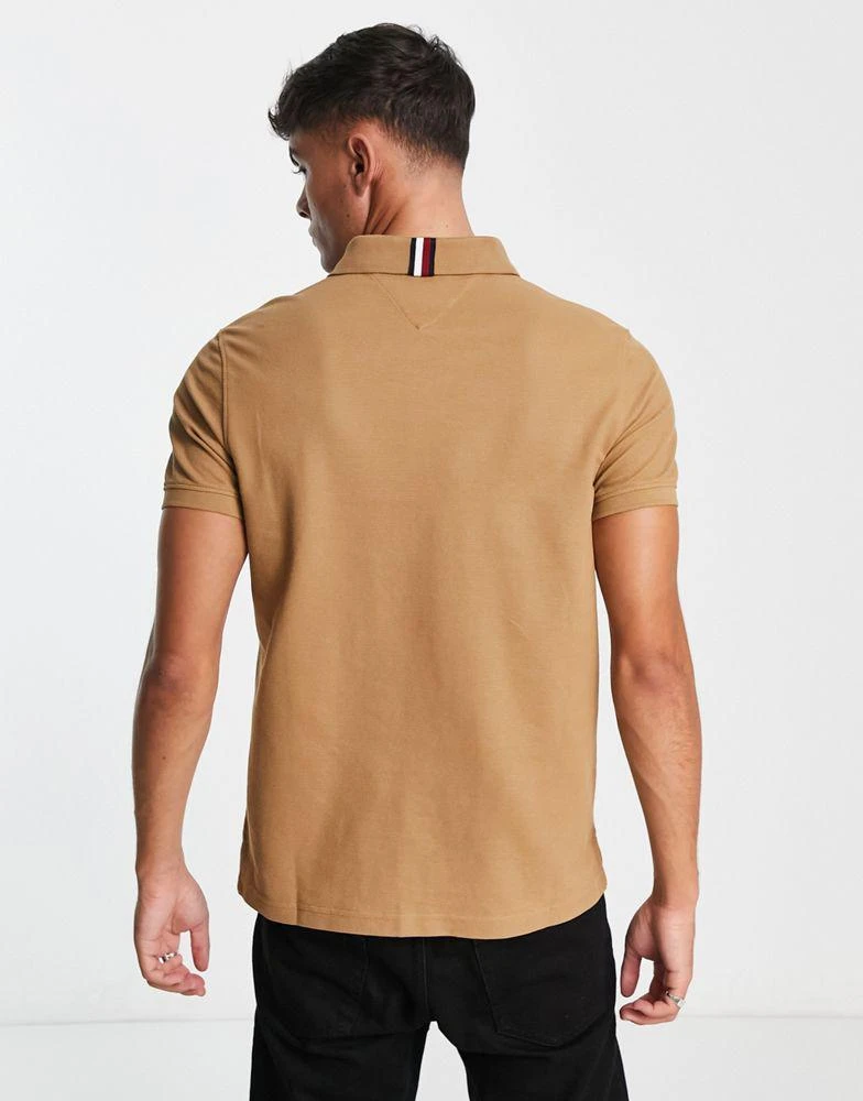 商品Tommy Hilfiger|Tommy Hilfiger monogram logo cotton blend pique polo in tan ,价格¥872,第2张图片详细描述