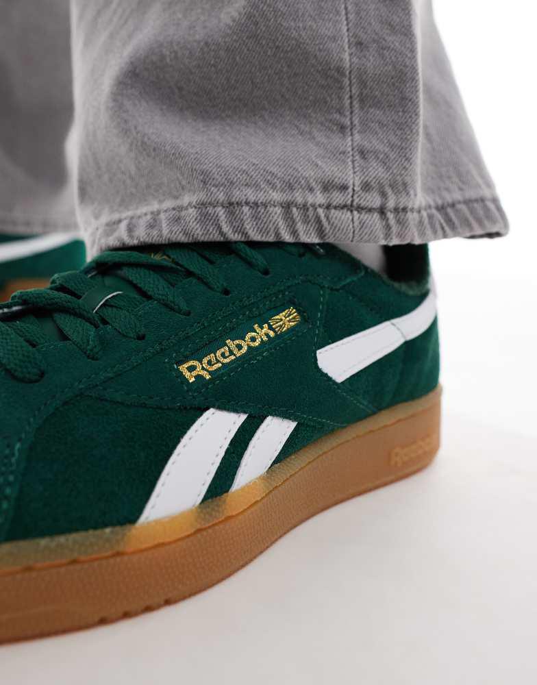 Shop Reebok Club C Grounds suede trainers with gum sole in green