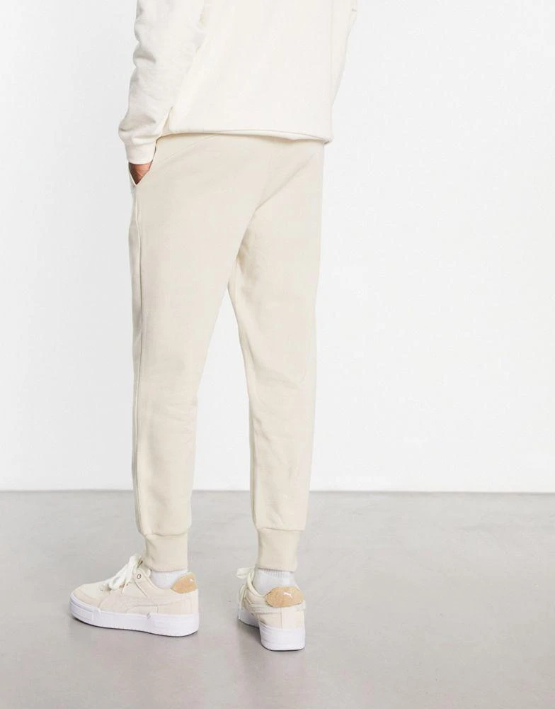 商品Puma|Puma essentials small logo joggers in off white,价格¥207,第3张图片详细描述