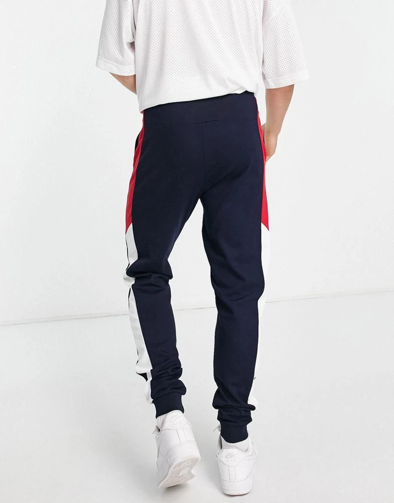 商品Tommy Hilfiger|Tommy Hilfiger Performance colorblock cuffed joggers in navy,价格¥584,第2张图片详细描述