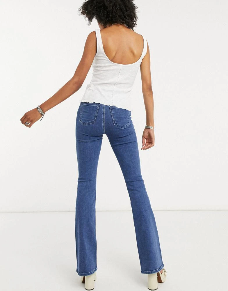 商品Topshop|Topshop Three Stretch flare Jean in Mid Blue,价格¥188,第2张图片详细描述