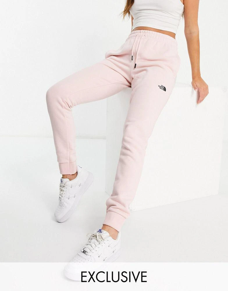 商品The North Face|The North Face Tight joggers in pink Exclusive at ASOS,价格¥345,第1张图片