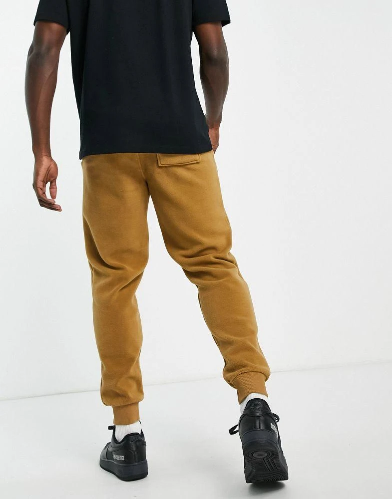 商品Calvin Klein|Calvin Klein ASOS Exclusive polar fleece joggers in tan,价格¥448,第2张图片详细描述