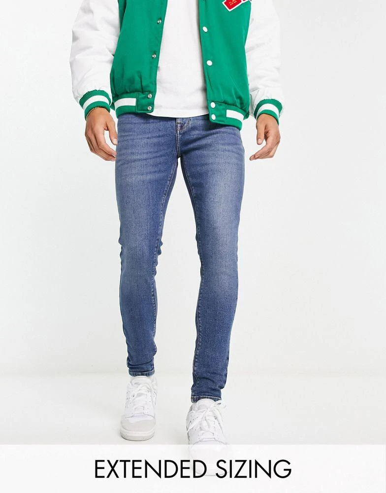 商品ASOS|ASOS DESIGN power stretch jeans in mid wash blue,价格¥174,第1张图片