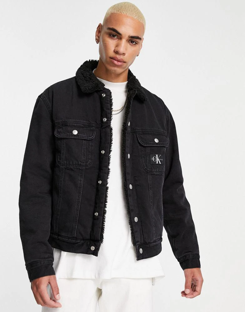 商品Calvin Klein|Calvin Klein Jeans sherpa lined denim jacket in black,价格¥856,第1张图片