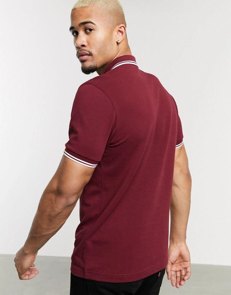 商品Fred Perry|Fred Perry twin tipped logo polo in burgundy,价格¥663,第2张图片详细描述