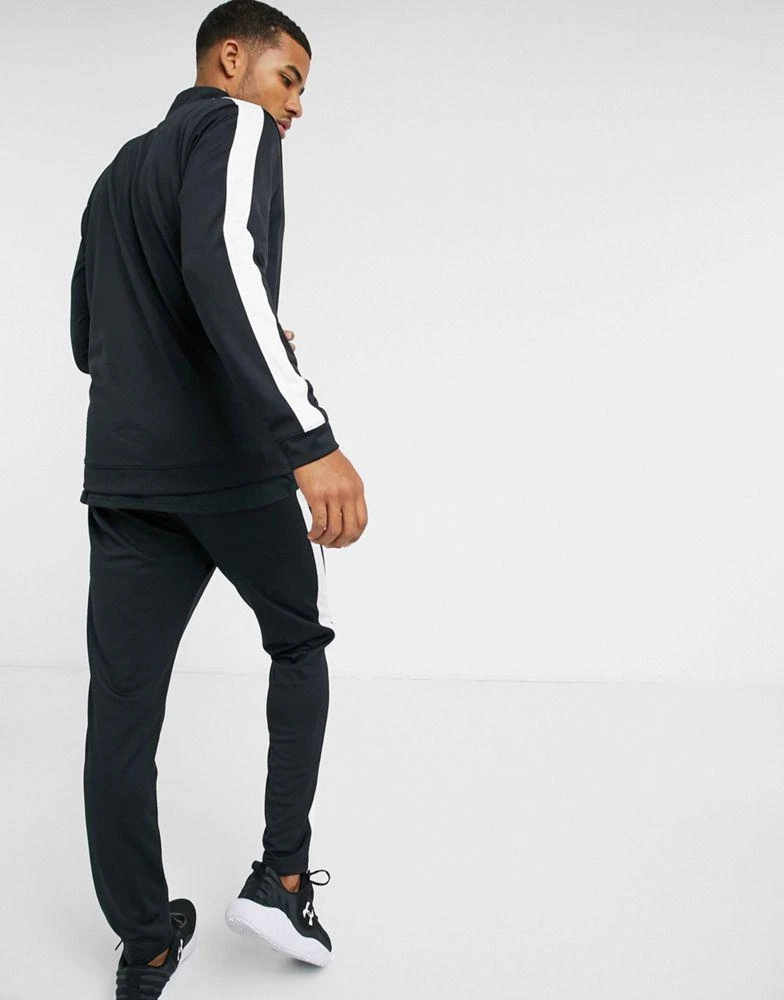商品Under Armour|Under Armour tracksuit set in black with white stripe,价格¥307,第2张图片详细描述