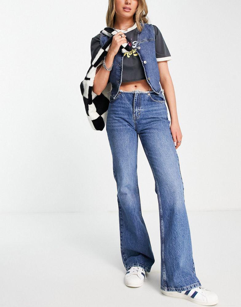 商品Topshop|Topshop raw waist band 90s flare jean in mid blue,价格¥359,第1张图片