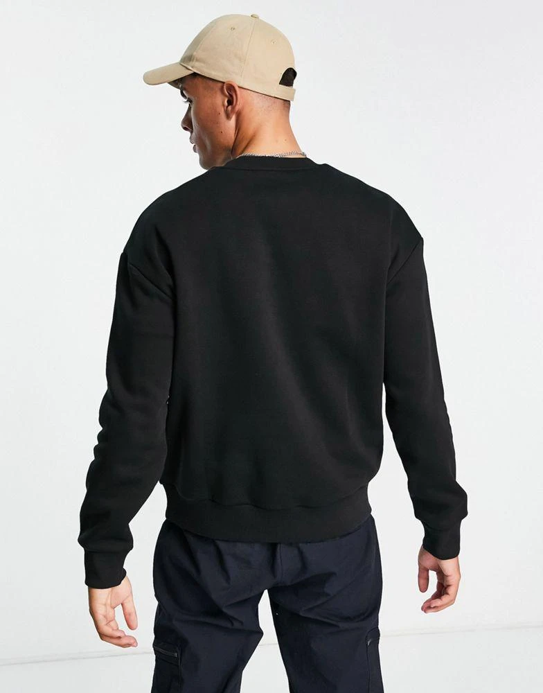 商品Calvin Klein|Calvin Klein textured logo box comfort sweatshirt in black,价格¥744,第2张图片详细描述