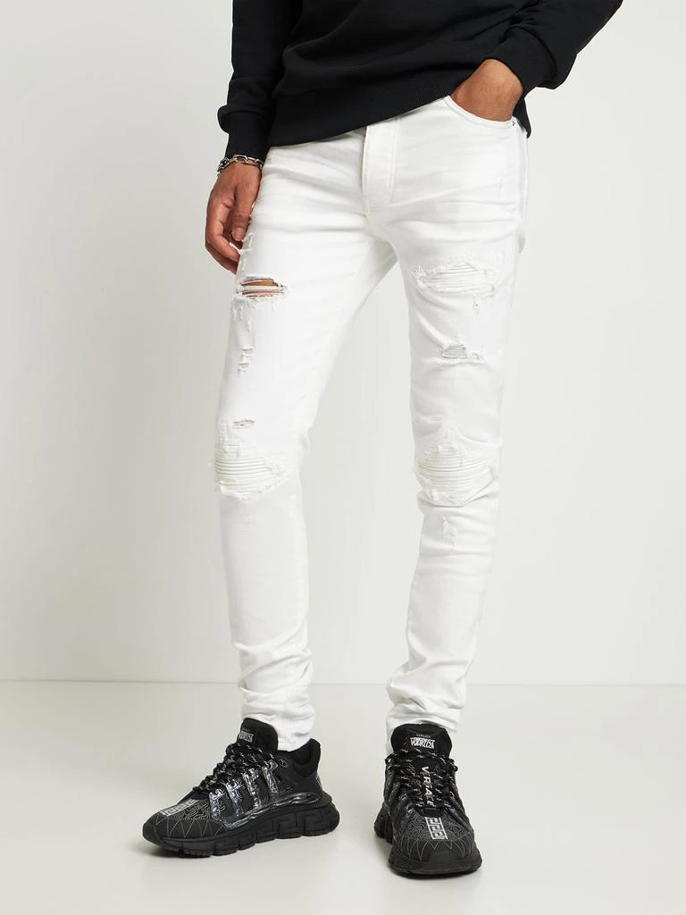 商品AMIRI|Mx1 Leather Patch Stretch Denim Jeans,价格¥8388,第2张图片详细描述