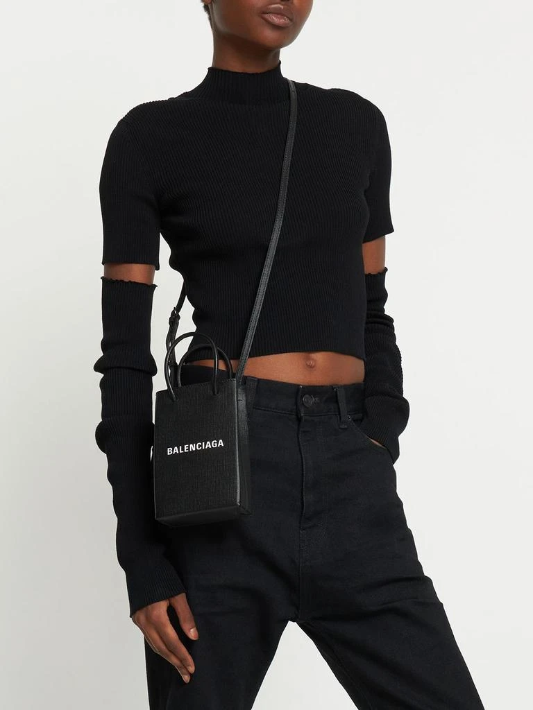 商品Balenciaga|Shopping Leather Phone Holder,价格¥8244,第1张图片详细描述