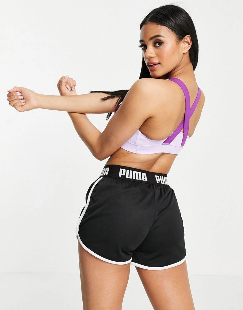 商品Puma|Puma Training First Mile mid support sports bra in purple,价格¥133,第2张图片详细描述