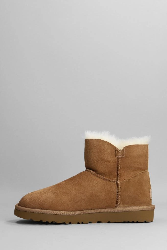 商品UGG|UGG Mini Bailey Buttonii Low Heels Ankle Boots In Leather Color Suede,价格¥1956,第3张图片详细描述