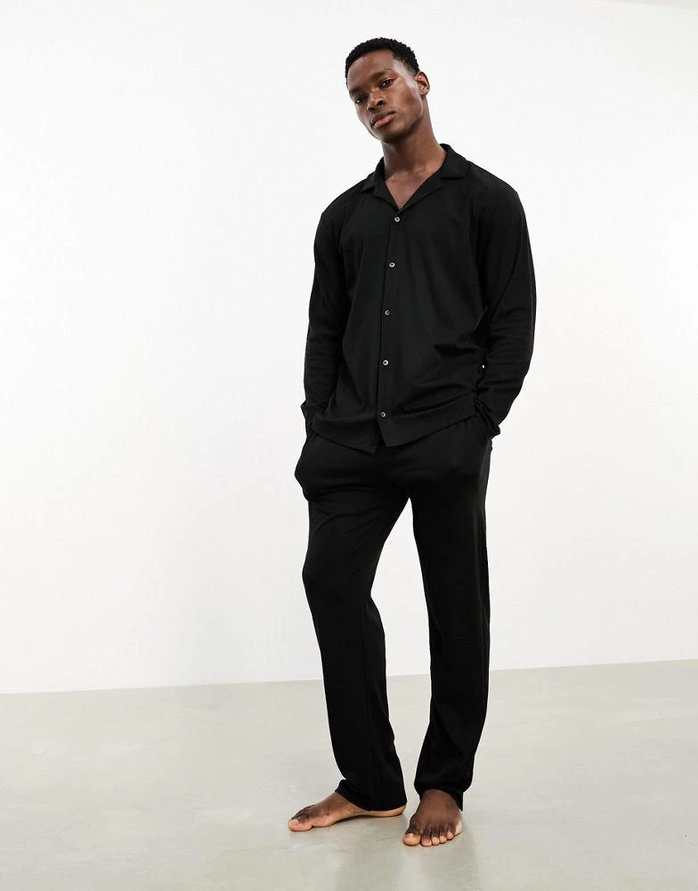 商品Calvin Klein|Calvin Klein CK Black button down sleep shirt and trouser pyjama set  in black,价格¥1265,第1张图片
