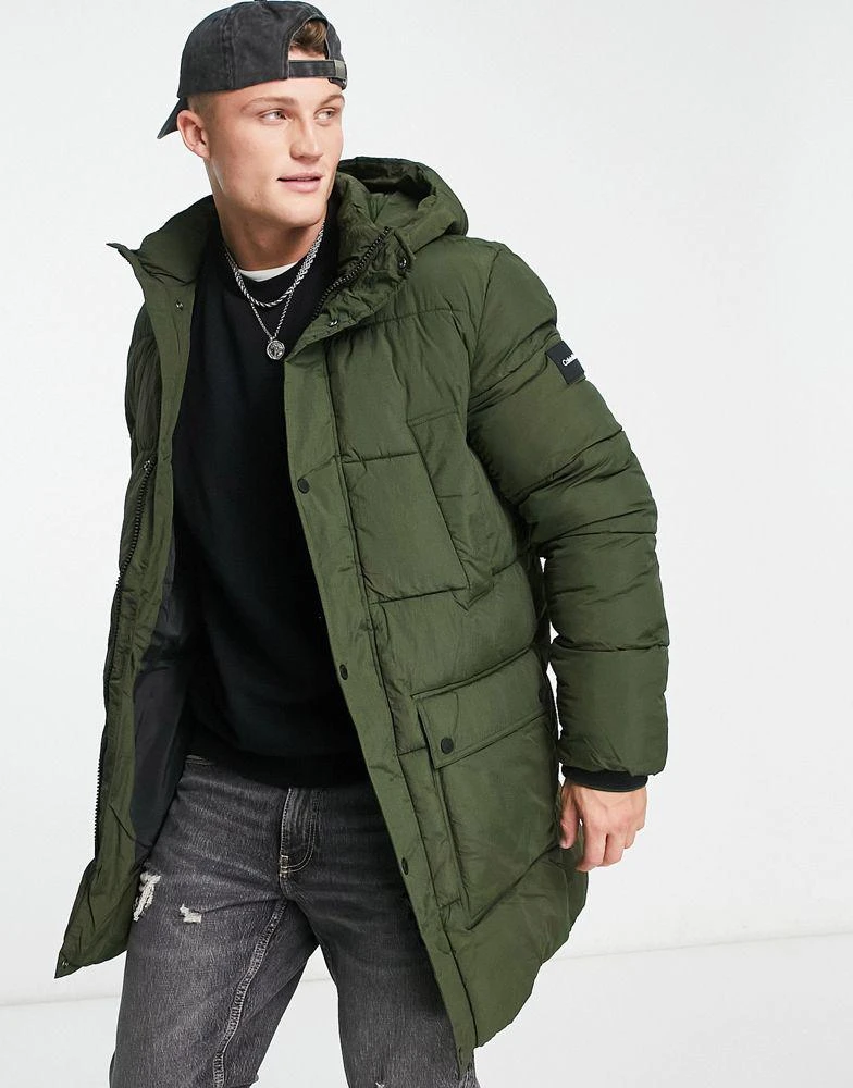 商品Calvin Klein|Calvin Klein crinkle nylon longline hooded puffer jacket in dark green,价格¥1877,第3张图片详细描述