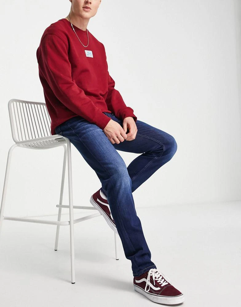 商品Tommy Hilfiger|Tommy Jeans Scanton slim fit jeans in dark wash,价格¥931,第4张图片详细描述