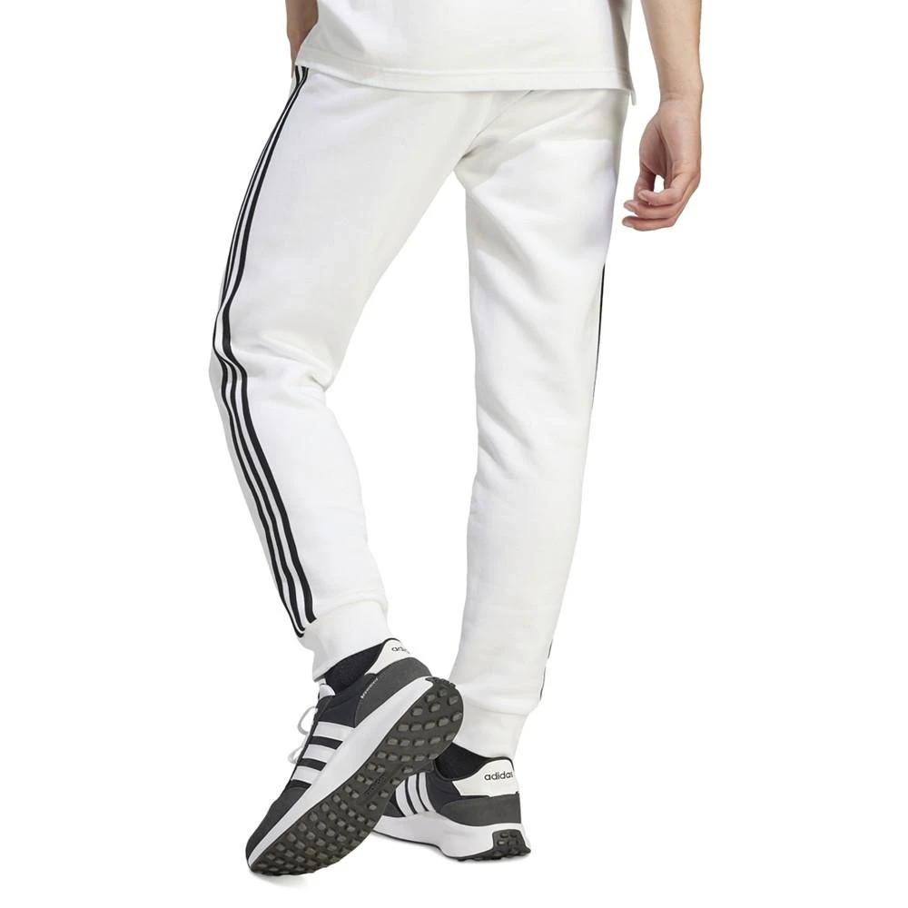 商品Adidas|Men's Essentials 3-Stripes Regular-Fit Fleece Joggers, Regular and Big & Tall,价格¥368,第2张图片详细描述
