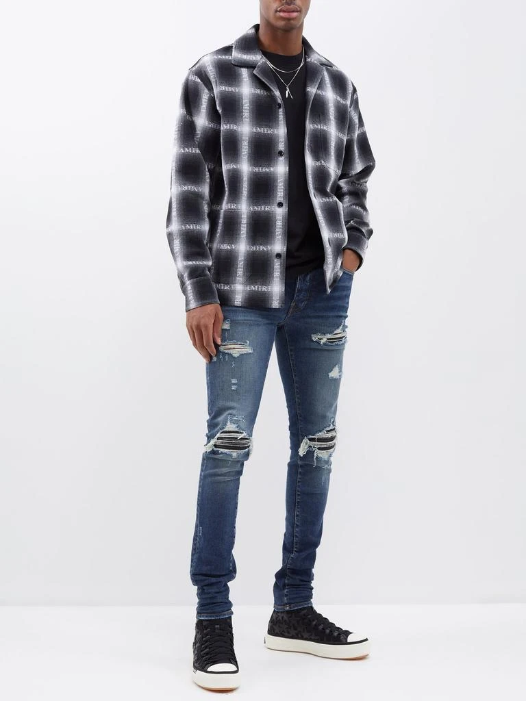 商品AMIRI|MX1 distressed skinny-leg jeans,价格¥5777,第2张图片详细描述