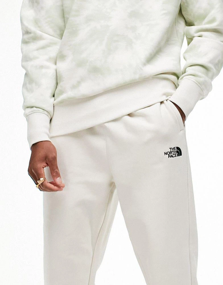 商品The North Face|The North Face Oversized Essential joggers in cream Exclusive at ASOS,价格¥360,第2张图片详细描述