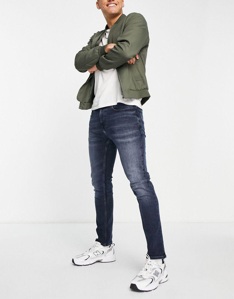 商品Tommy Hilfiger|Tommy Jeans Austin slim tapered fit jeans in dark wash,价格¥554,第6张图片详细描述