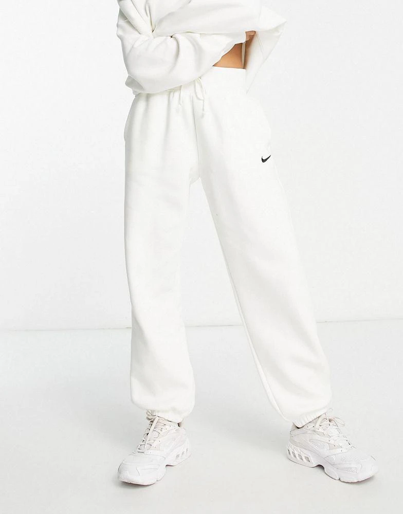 商品NIKE|Nike mini swoosh oversized high rise joggers in sail white,价格¥529,第1张图片