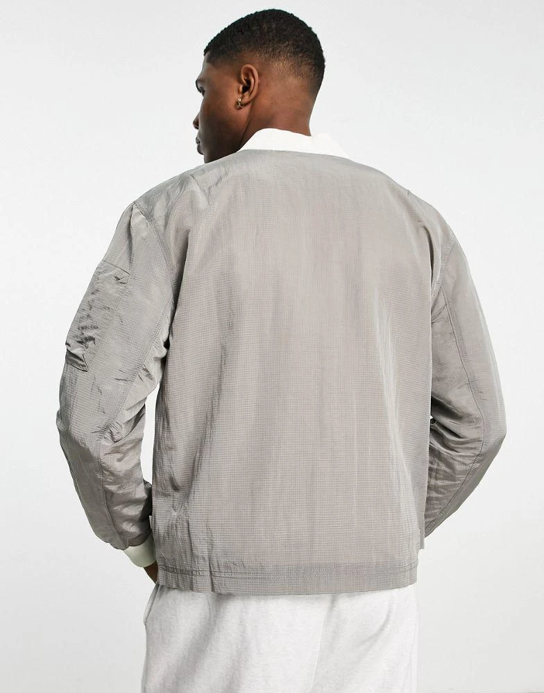 商品NIKE|Nike Premium Essentials lined bomber jacket in stone,价格¥511,第2张图片详细描述