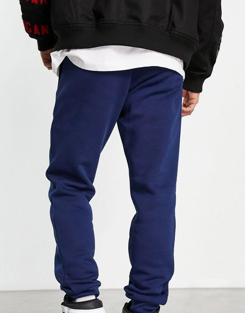 商品Adidas|adidas Originals trefoil essentials joggers in navy,价格¥499,第2张图片详细描述