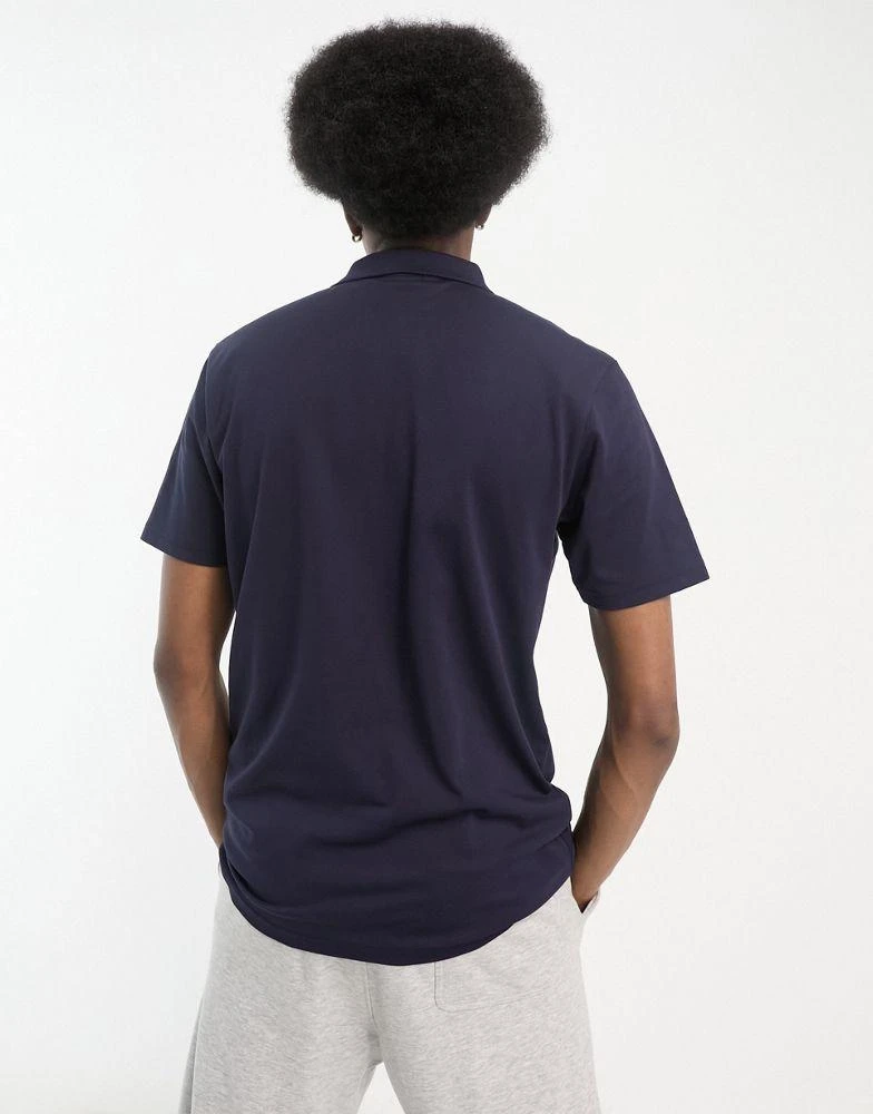 商品Calvin Klein|Calvin Klein Golf Parker chest stripe polo shirt in navy,价格¥496,第3张图片详细描述