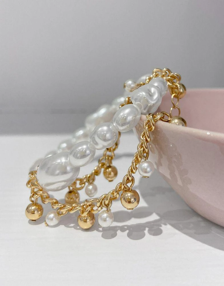 商品ASOS|ASOS DESIGN pack of 2 bracelets in pearl and curb chain in gold tone,价格¥57,第3张图片详细描述