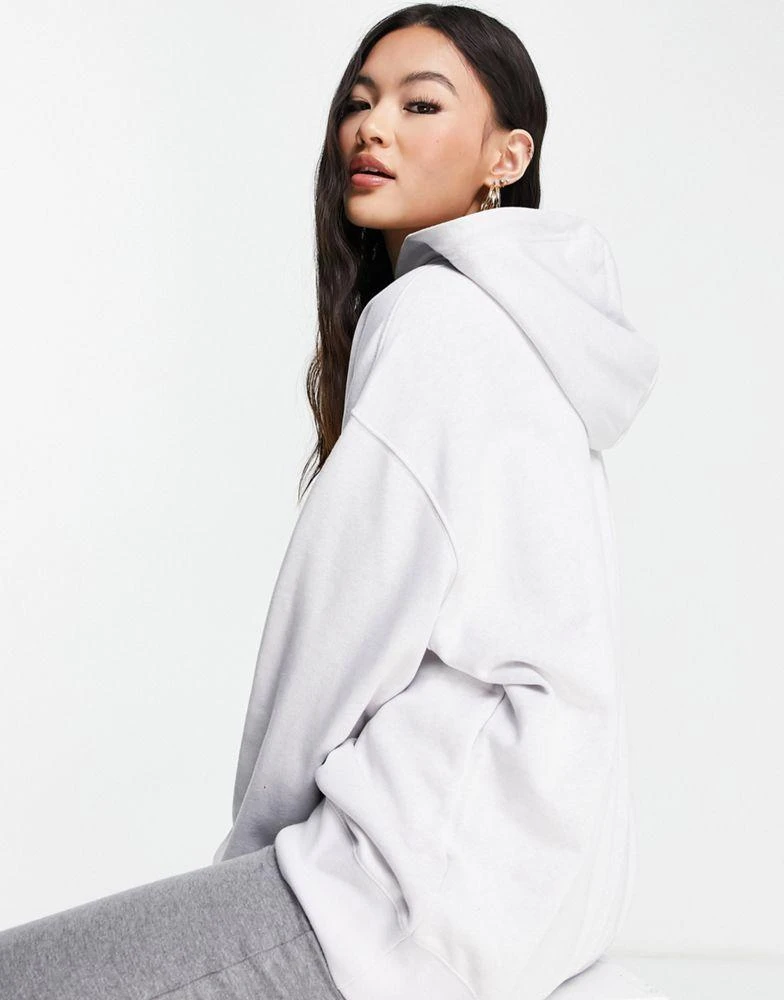 商品NIKE|Nike Lounge essential fleece oversized hoodie in grey marl,价格¥289,第2张图片详细描述